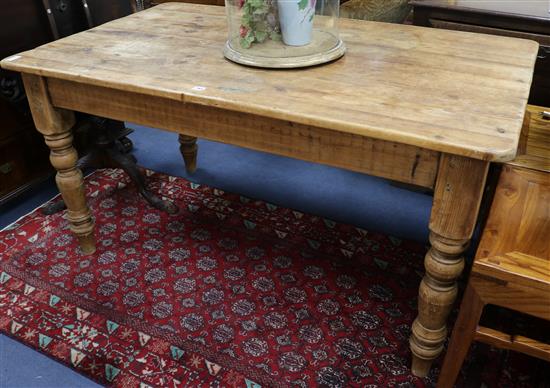 A pine kitchen table, W.153cm